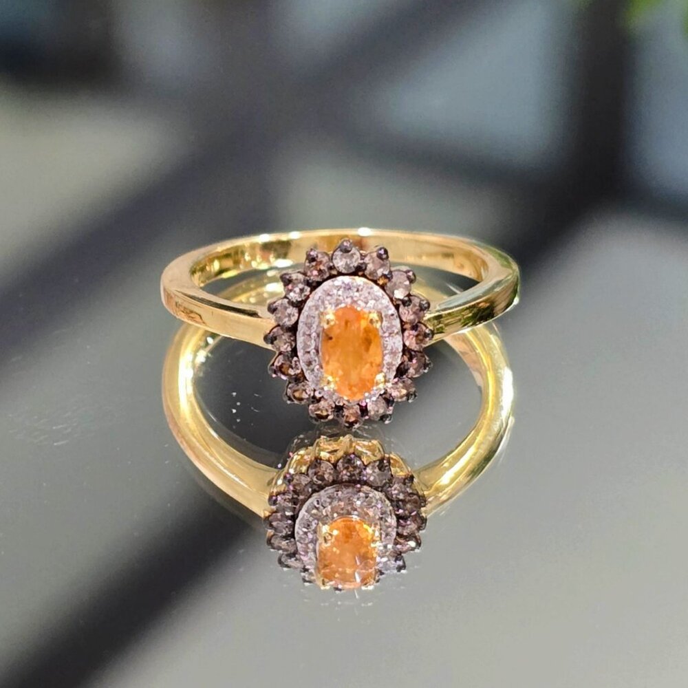 Artisan Gold Ring with Orange Center Stone and Clear Halo